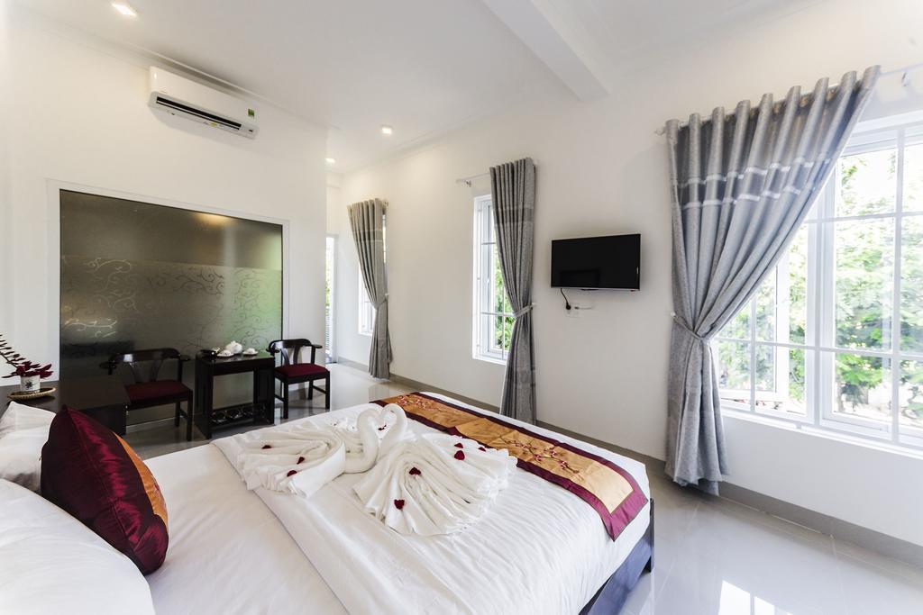 Old Well Homestay Hội An Extérieur photo